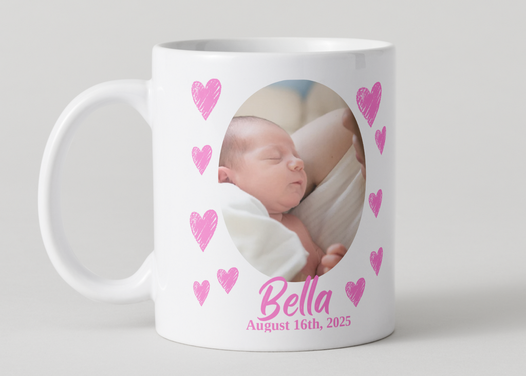White mug with a photo of a baby and pink hearts on a white background