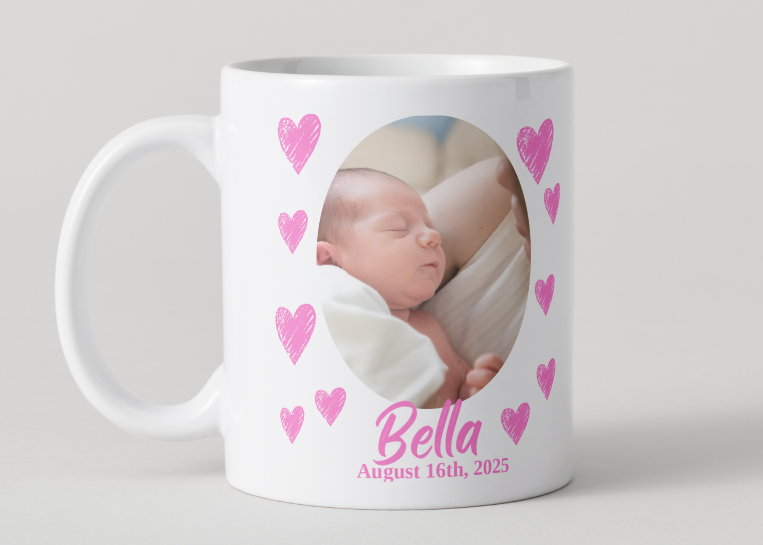 White mug with a photo of a baby and pink hearts on a white background