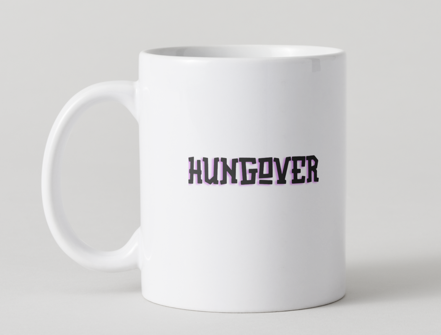 White mug with 'HUNGOVER' text on a light gray background