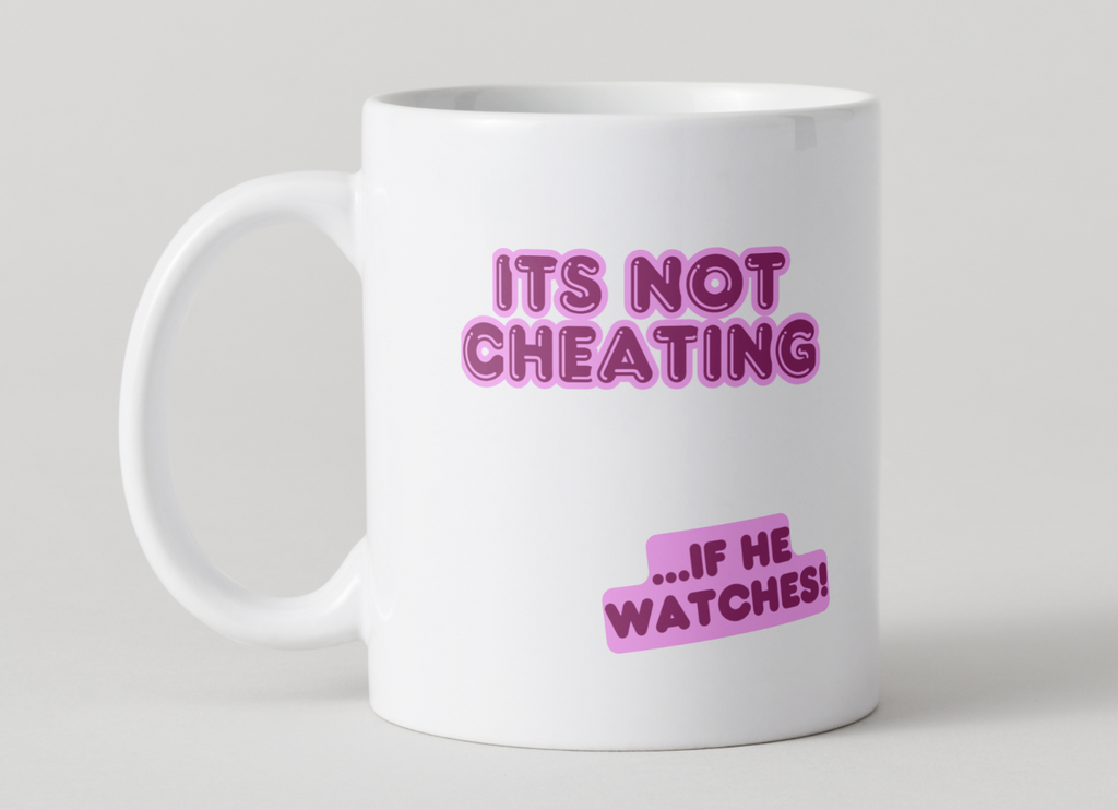 White mug with Pink 'It's not cheating ...if he watches' design on a light gray 