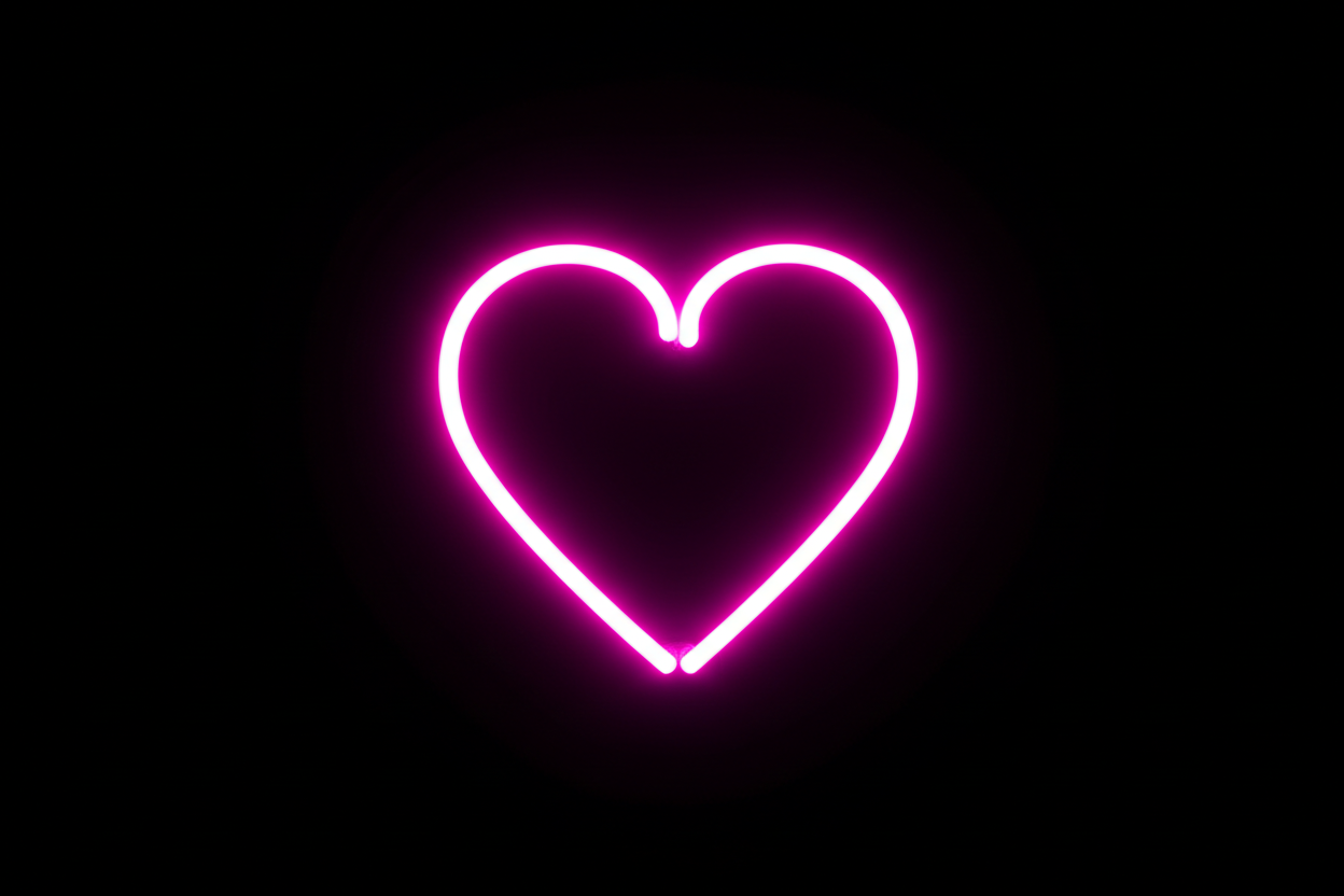 black background with neon pink heart in the centre