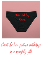 Black underwear with 'Owned by Sam' text on a pink background